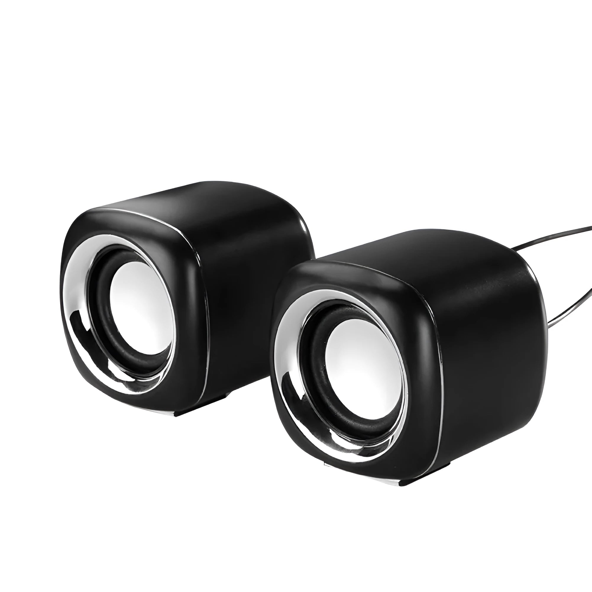 Pair of black wired mini desktop computer speakers with 3.5mm plug and scroll wheel volume control on a desk