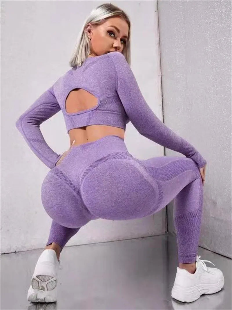 Two-piece sports suit with long sleeve hollow top and high waist seamless leggings in green