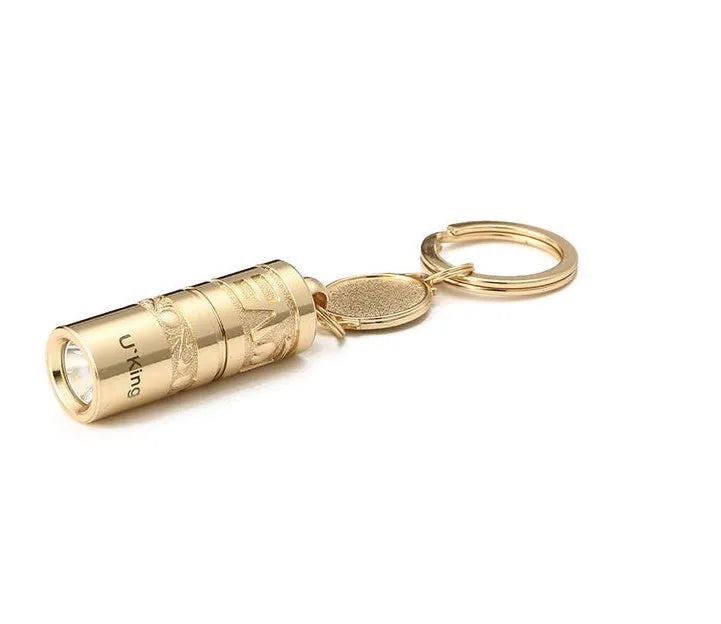Gold zinc alloy waterproof LED flashlight keychain showing 7cm compact design