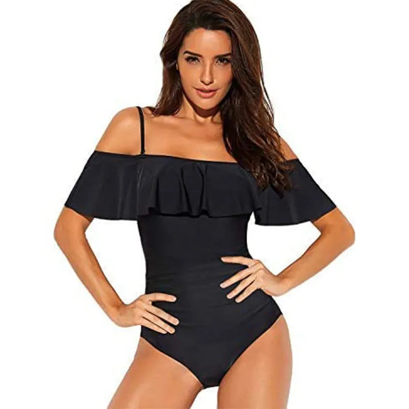 Black one-piece swimsuit with cut-out ruffled straps on a tube top