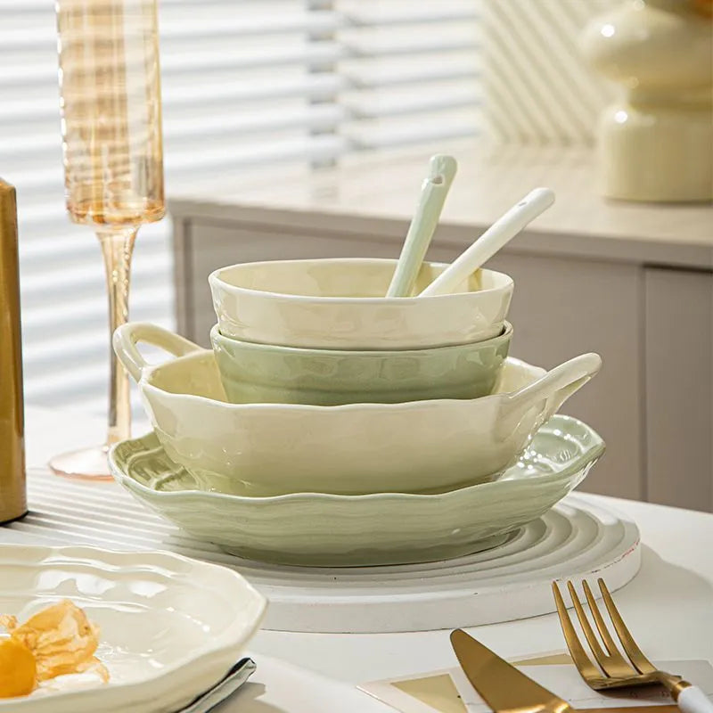 Seven-piece solid colour ceramic tableware set in a gift box, showing minimalist Japanese style plates and bowls.