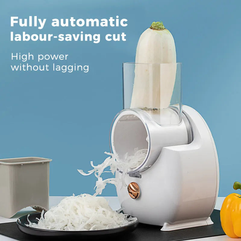 White electric vegetable slicer with suction base and multiple blades for cutting potatoes and carrots
