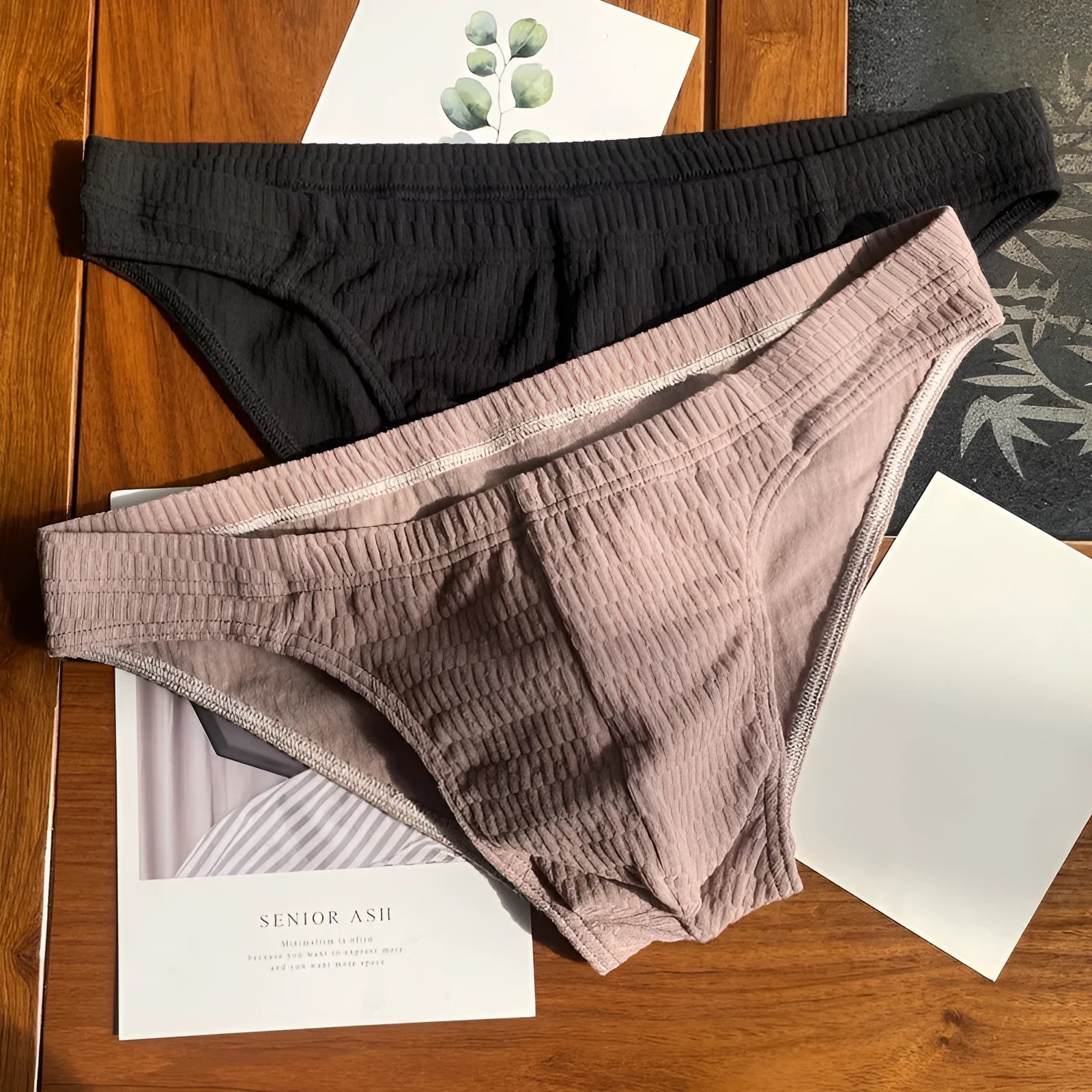 Men's solid colour pure cotton triangle underwear briefs in mid-waist style on a white background.