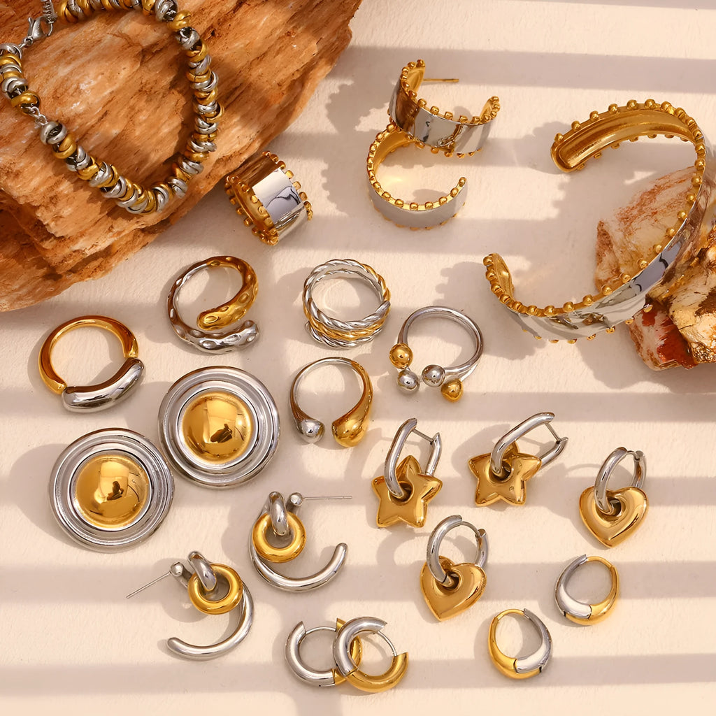 Women's gold electroplated stainless steel jewellery set showing earrings, bracelet, and necklace with geometry design