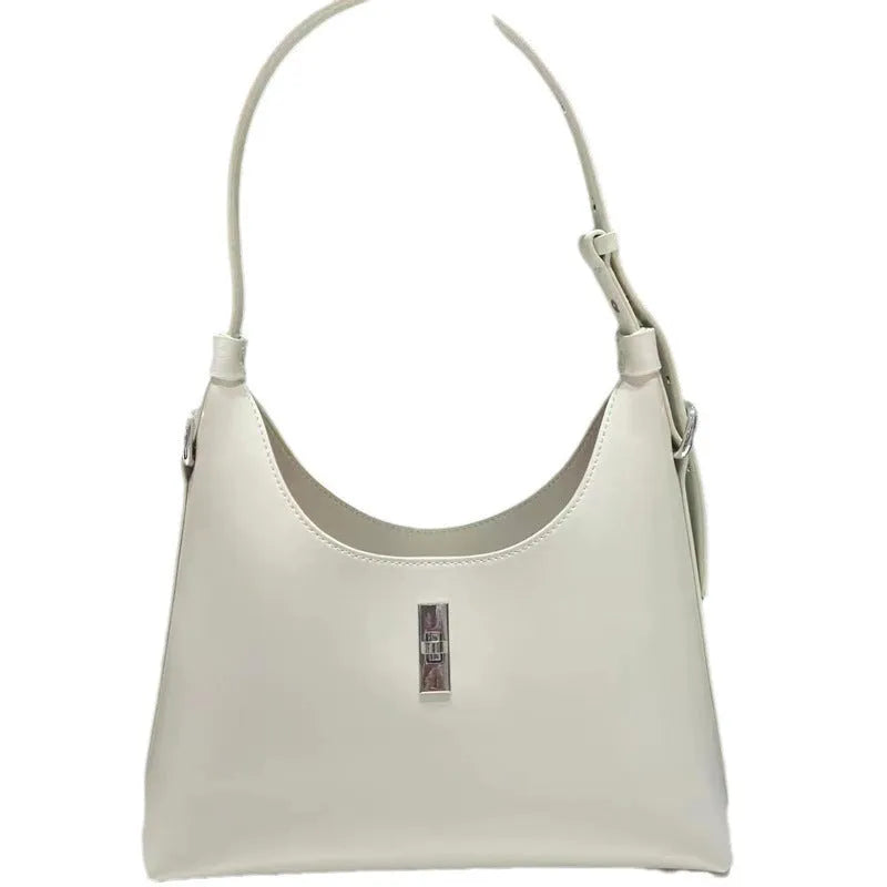 Soft brown genuine leather dumpling-shaped crossbody bag with a front sandwich pocket.