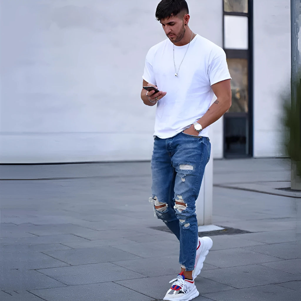 Men's deep blue cotton jeans showing front view with traditional five-pocket design