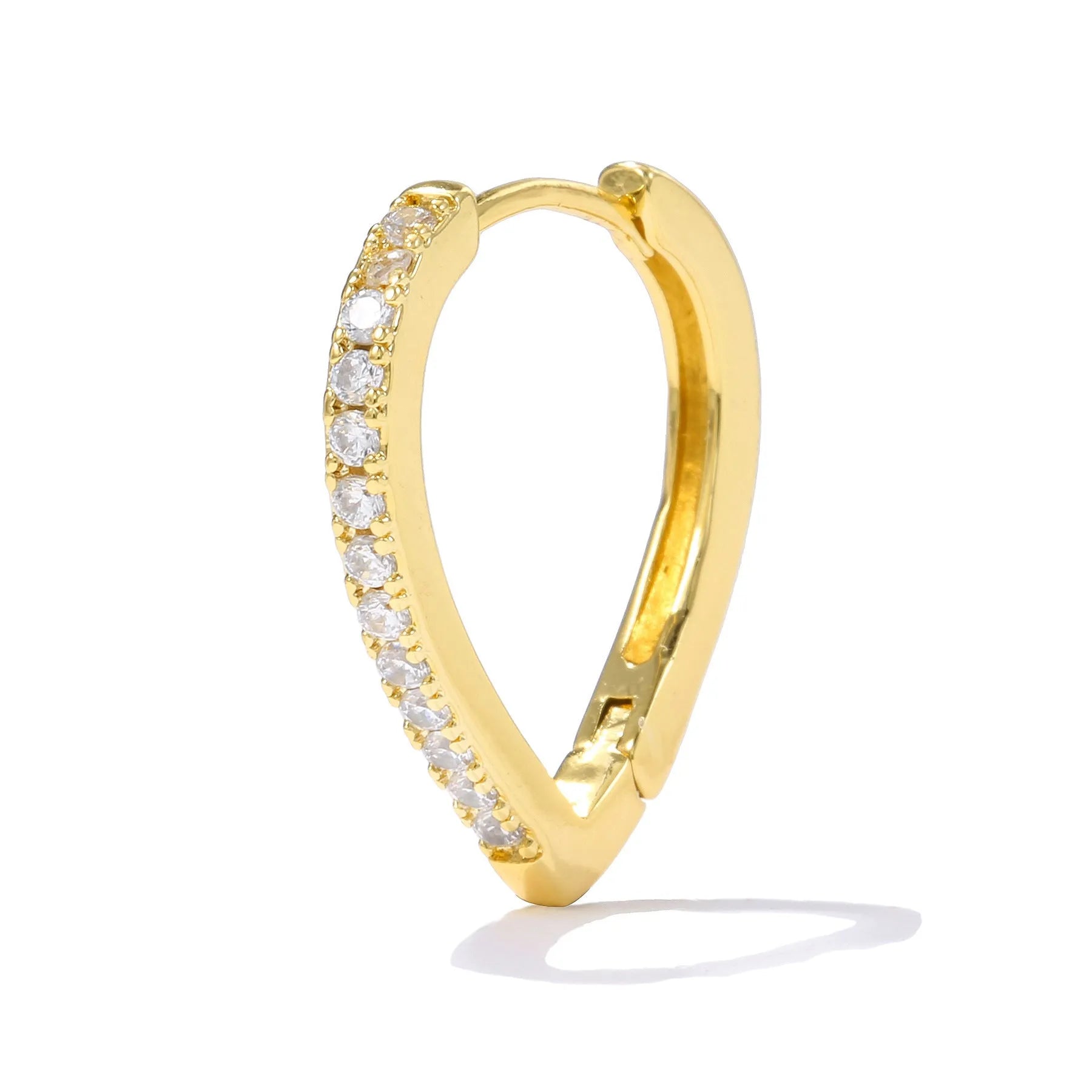 Geometric gold tone love heart clip-on earring for women on a white background.