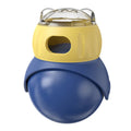 Morandi yellow and blue plastic owl-shaped cat puzzle feeder toy on a floor