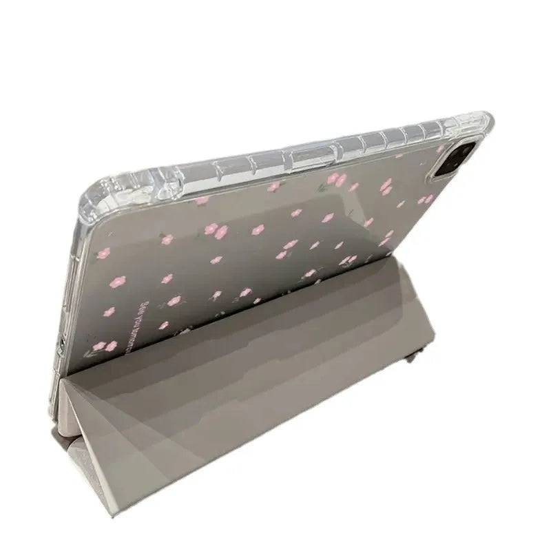 Transparent floral patterned tri-fold iPad case with magnetic stand function showing compatible tablet models