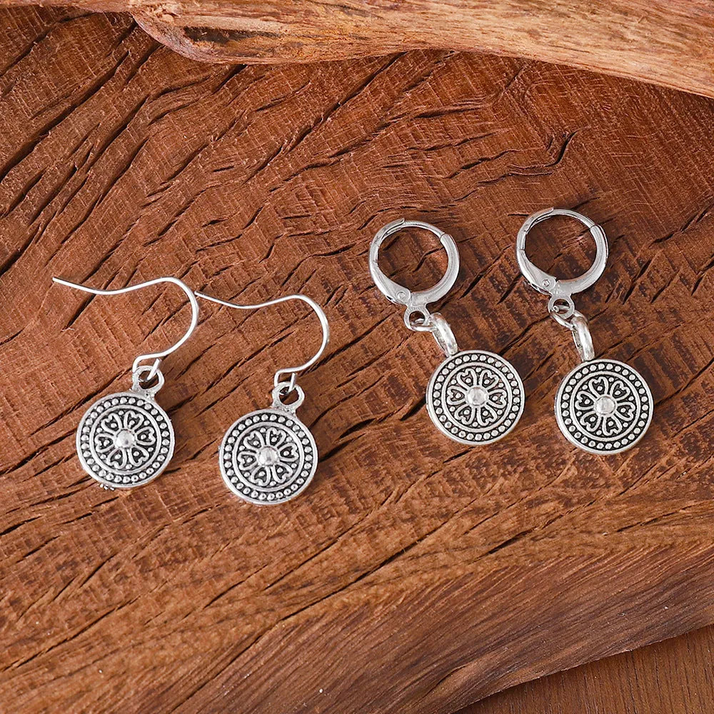 Bohemian style geometric round earrings with distressed ethnic print and retro electroplated finish