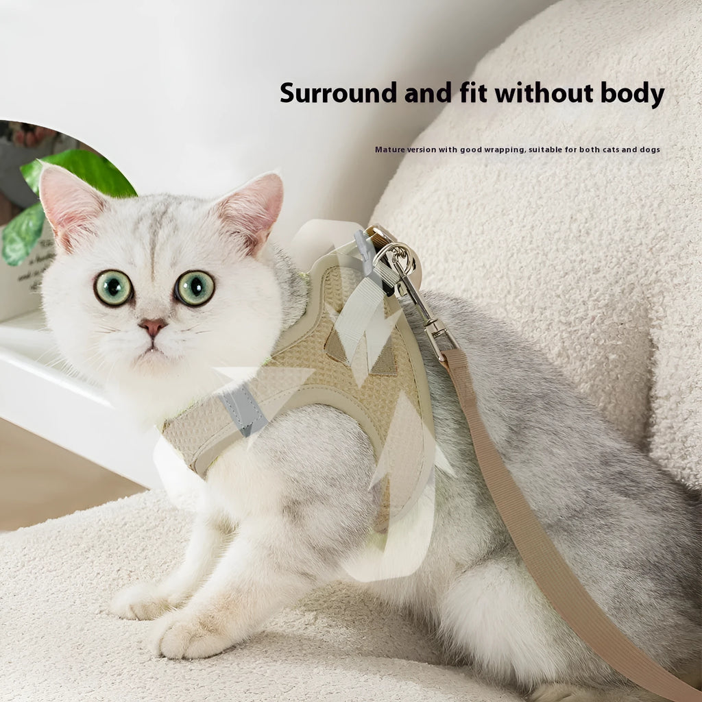 Brown cloth cat harness with chest strap and hand holding rope showing waffle texture pattern