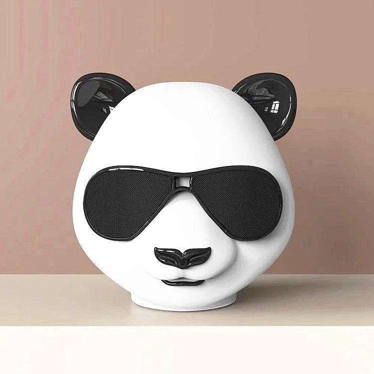 Classic style portable mini Bluetooth speaker with USB charging port.