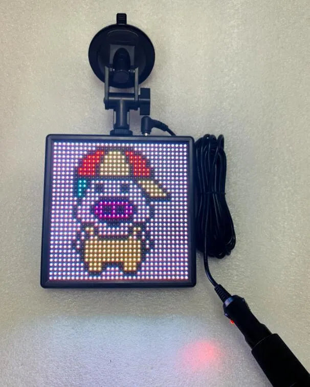 32x32 Bluetooth wireless LED car display screen with aluminium frame on a car window
