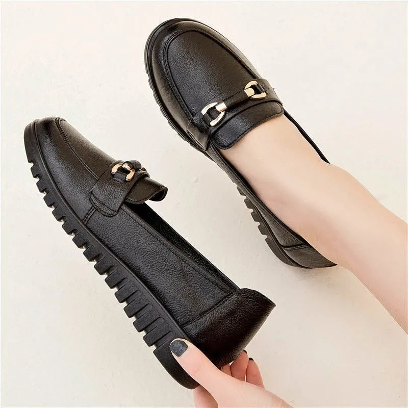 Black flat heel pumps with soft microfiber upper, round toe, and metal accent, low 1-3cm heel