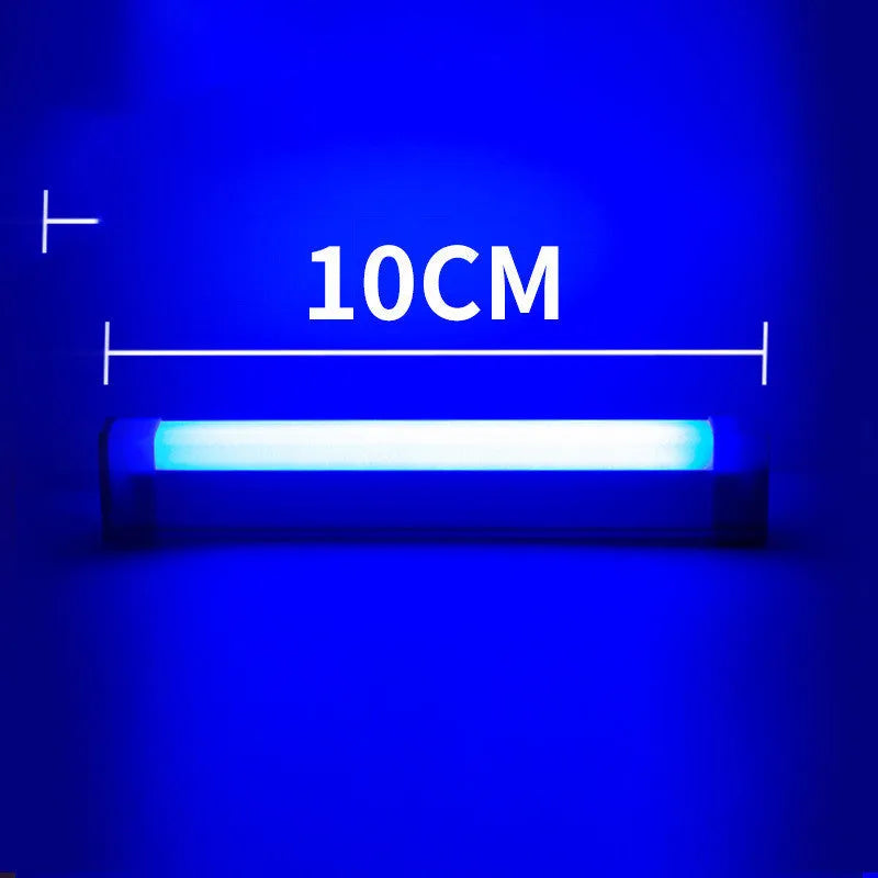 Blue and purple rechargeable LED tube stick light resting on a surface, showcasing its slim design.