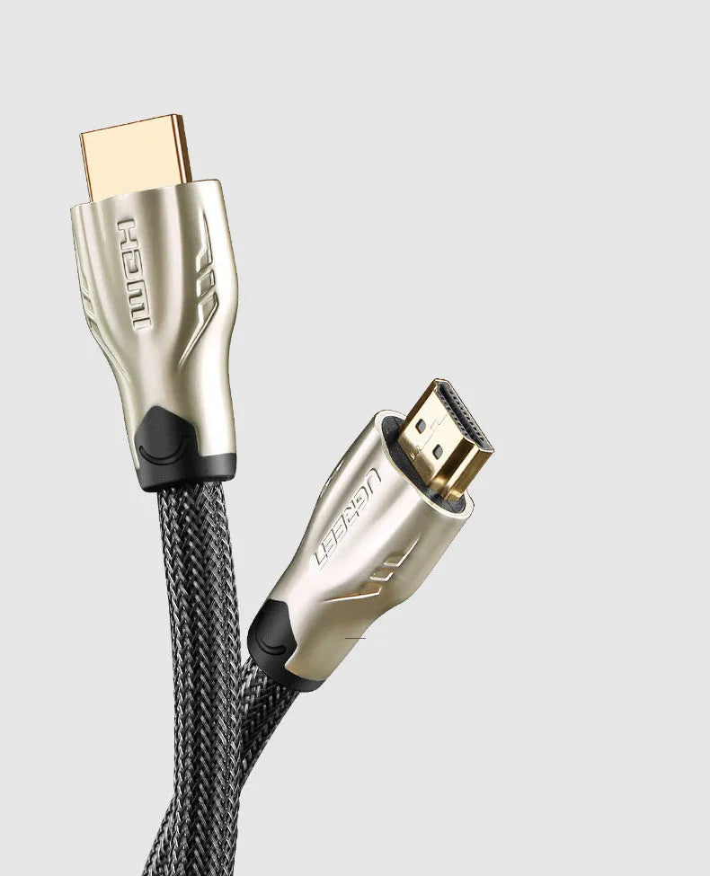 A 5-metre long black HDMI cable with gold-plated connectors, coiled on a white background.