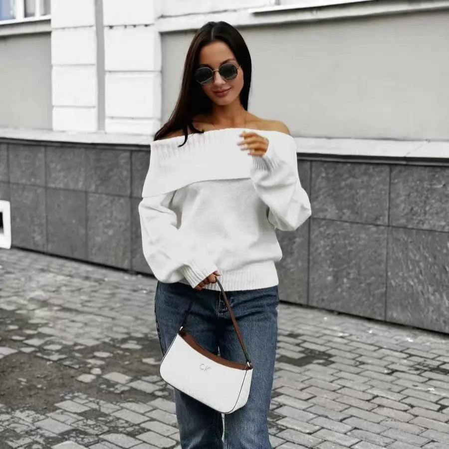 Grey off-the-shoulder strapless sweater with a 3D pattern, shown as a pullover.