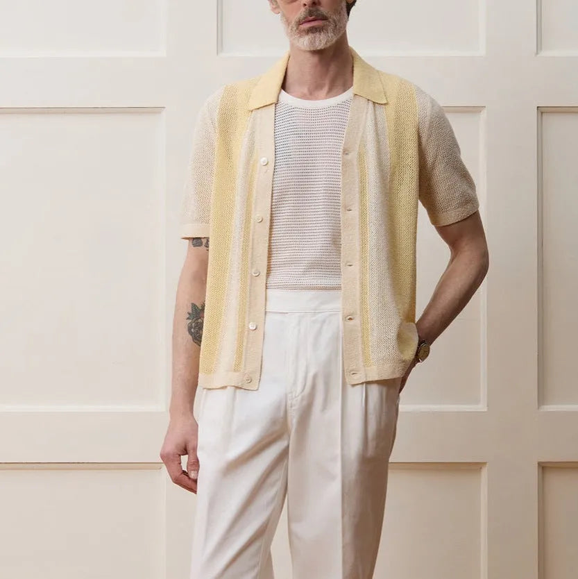 Hollow-out short-sleeved Tencel polo shirt in yellow with asymmetric design