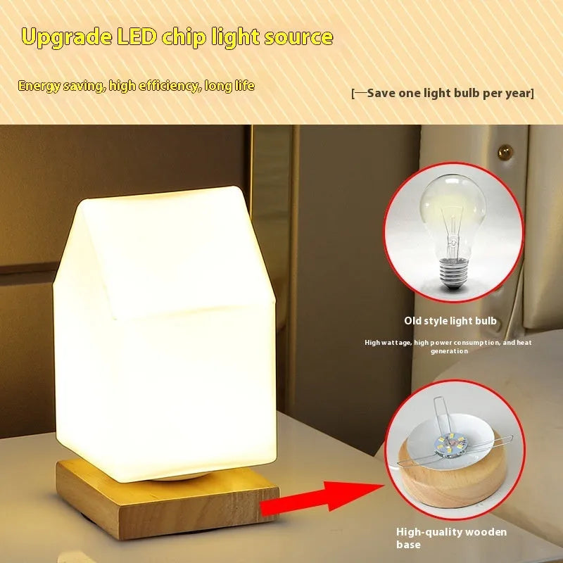 Nordic solid wood USB bedside lamp with flower-shaped design in white cylinder style on wooden surface