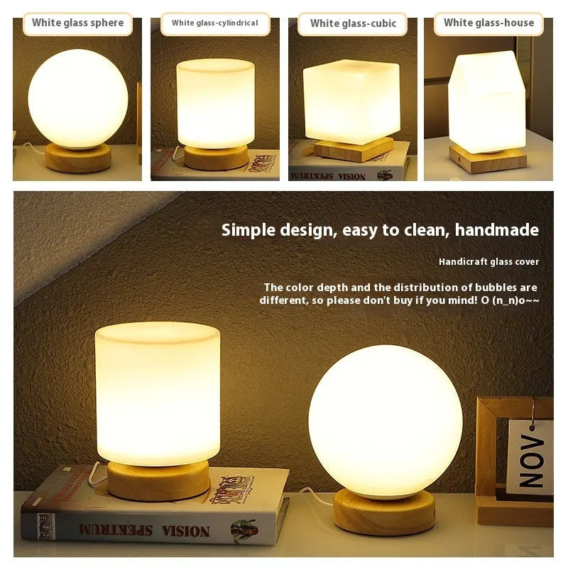 Nordic solid wood USB bedside lamp with flower-shaped design in white cylinder style on wooden surface