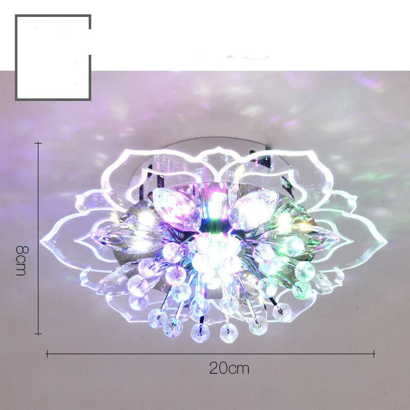 Modern crystal ceiling lamp with flower-shaped acrylic and crystal shade showing LED lighting