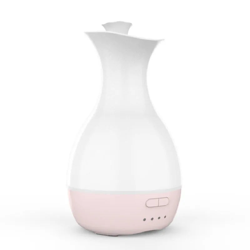 White ultrasonic humidifier diffuser with colourful LED night lights and mist output