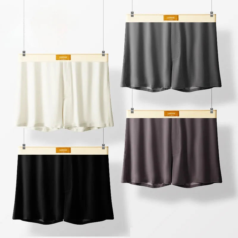 Three pairs of solid colour men's ice silk boxer shorts in loose fit mid-waist design