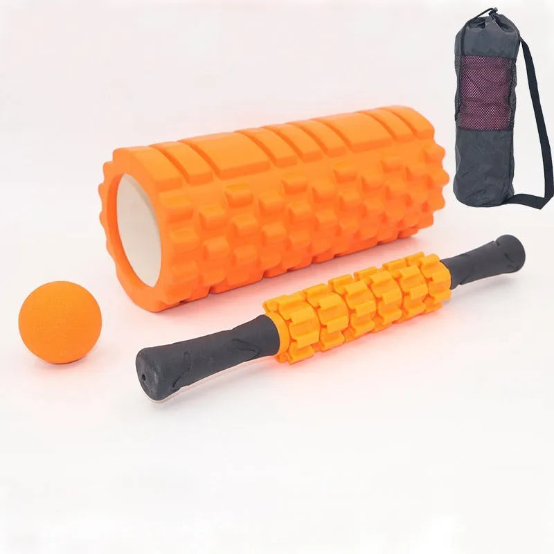 Black foam roller massage bar with gear-like segments, measuring 33cm in length