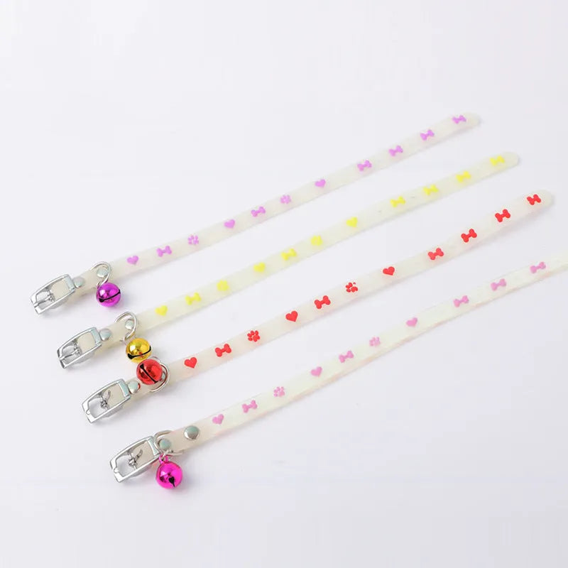 Meow Xinbao glow in the dark adjustable cat collar with metal bell on a silicone chain.