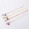 Meow Xinbao glow in the dark adjustable cat collar with metal bell on a silicone chain.