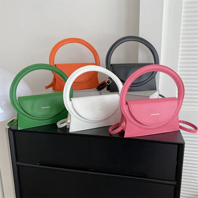 Horizontal square PU leather messenger bag with stitching detail and internal phone pocket