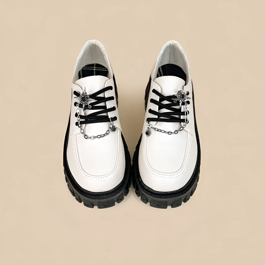 Women's preppy style loafers in Duke Asterism colour with cross shoulder strap and round toe