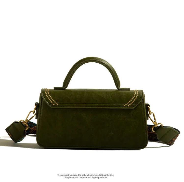 Brown vertical square messenger bag made of PU leather with a front sandwich pocket.