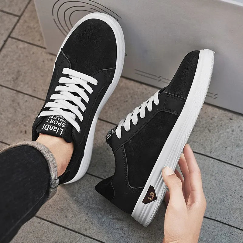 Men's low-top casual sneakers with snake pattern in black, PU upper, round toe, on a neutral background.