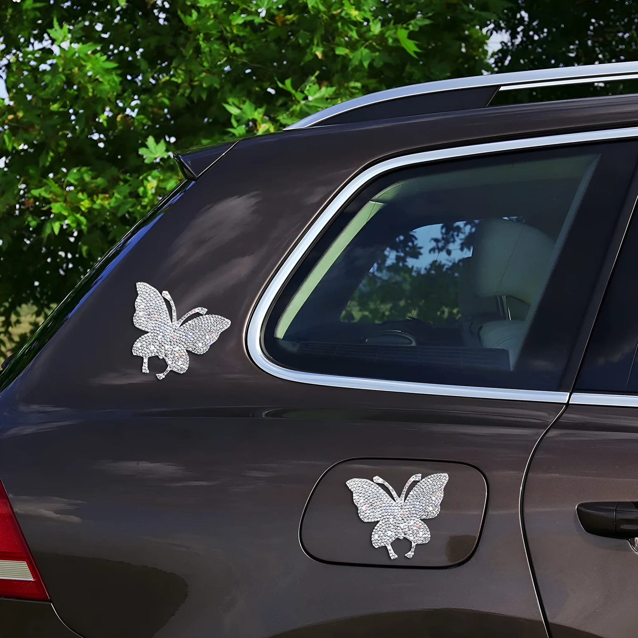 Diamond-encrusted car sticker with butterfly or bear paw design measuring 7 by 6 centimetres