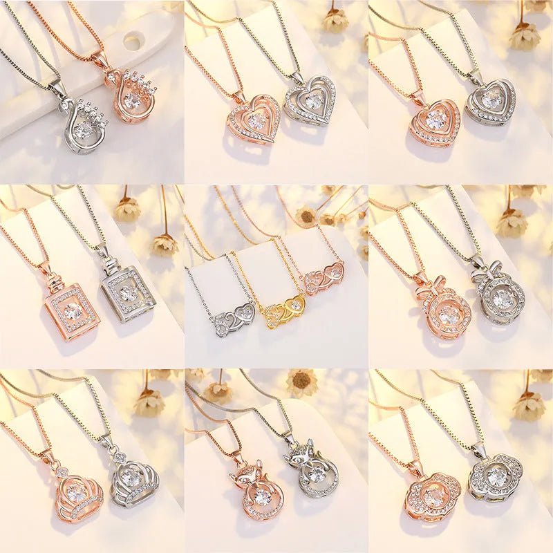 Sterling silver heart necklace with crown and bow detailing pendant in rose gold or silver finish