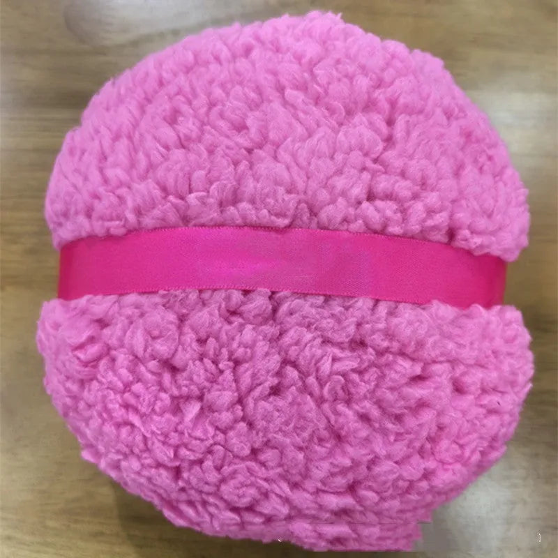 Oversized rectangular plush powder puff for makeup, shown in white, pink, and skin colour options.