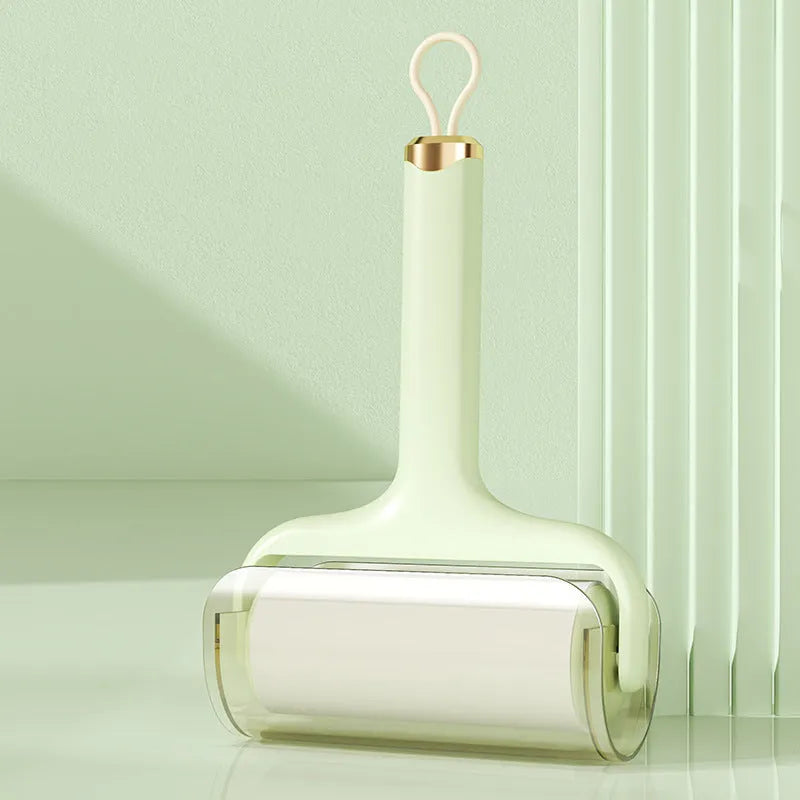 Sticky hair roller with high-viscosity adhesive paper, tear-type replacement sheets, in green colour on fabric