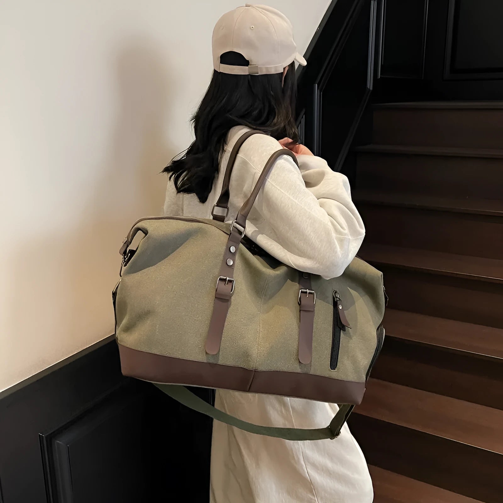 Canvas travel shoulder bag for men and women in solid black colour, breathable fabric, compact unisex design