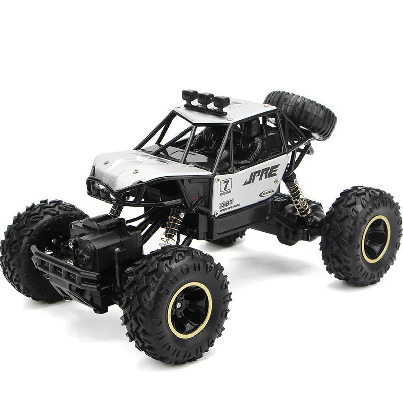 Large black 2.4G remote control four-wheel drive off-road climbing car on rough terrain
