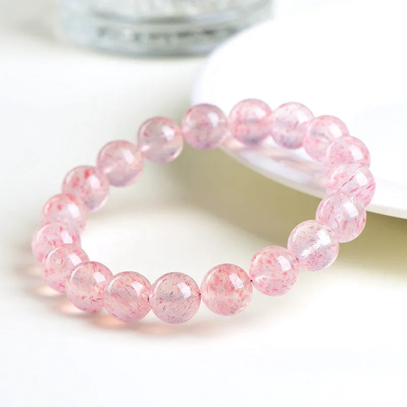 Strawberry quartz crystal bracelet with white water body geometric beads measuring 10-10.8mm