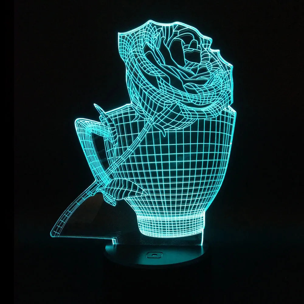 3D rose flower night light with colour-changing LED and remote control on a black base.