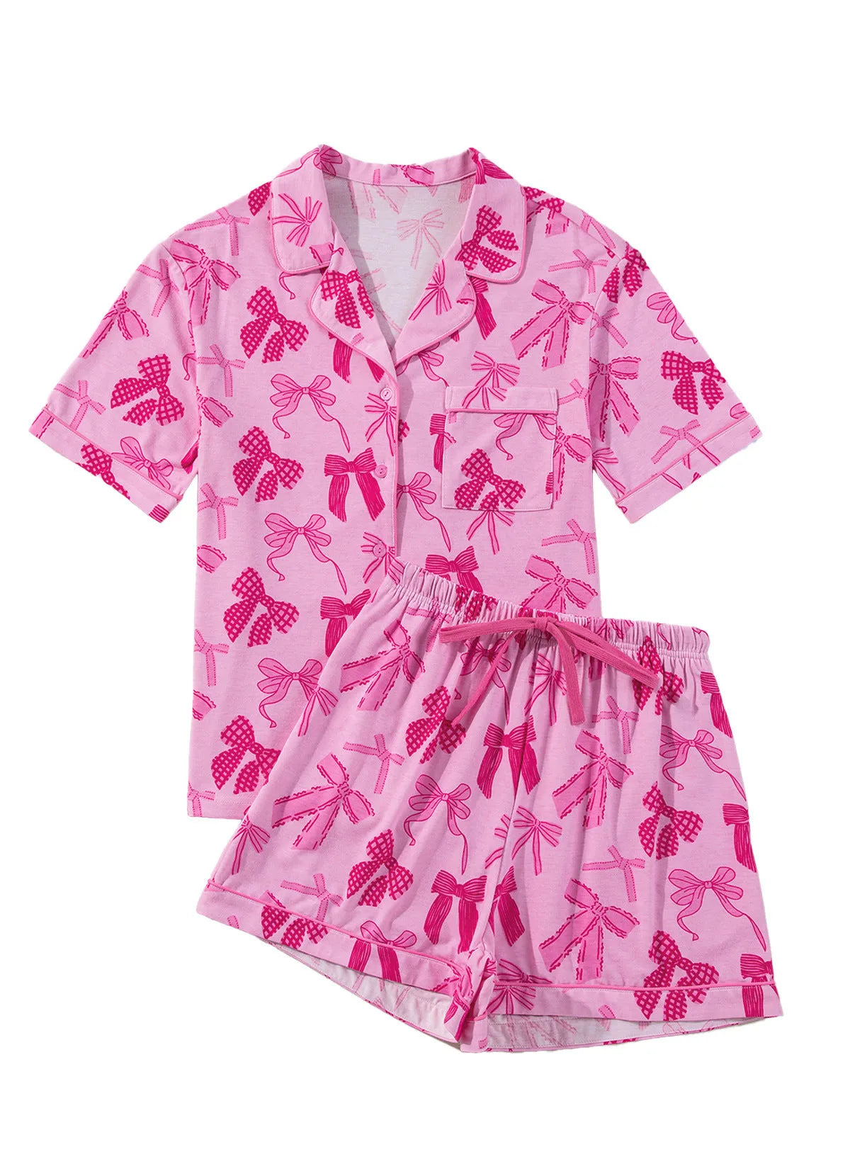 Pink polyester pyjama set with bow print, showing top and pants for sleepwear.