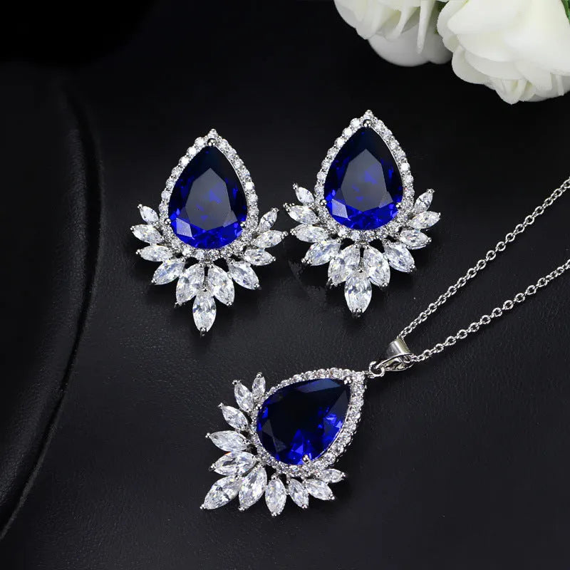 Blue bridal banquet jewellery set with necklace featuring a centrepiece pendant and matching bracelet.