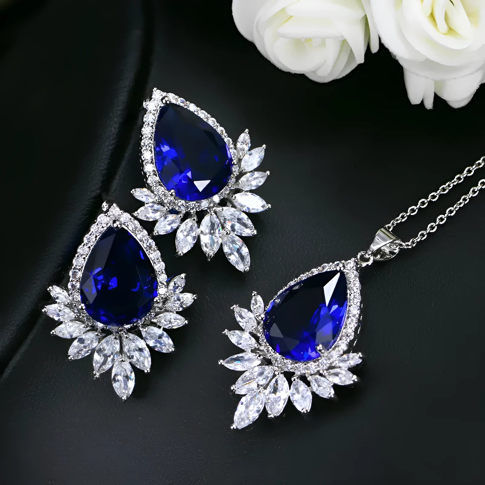 Blue bridal banquet jewellery set with necklace featuring a centrepiece pendant and matching bracelet.