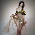 Gold strapless sequined long dress with tulle skirt and side slit detail.