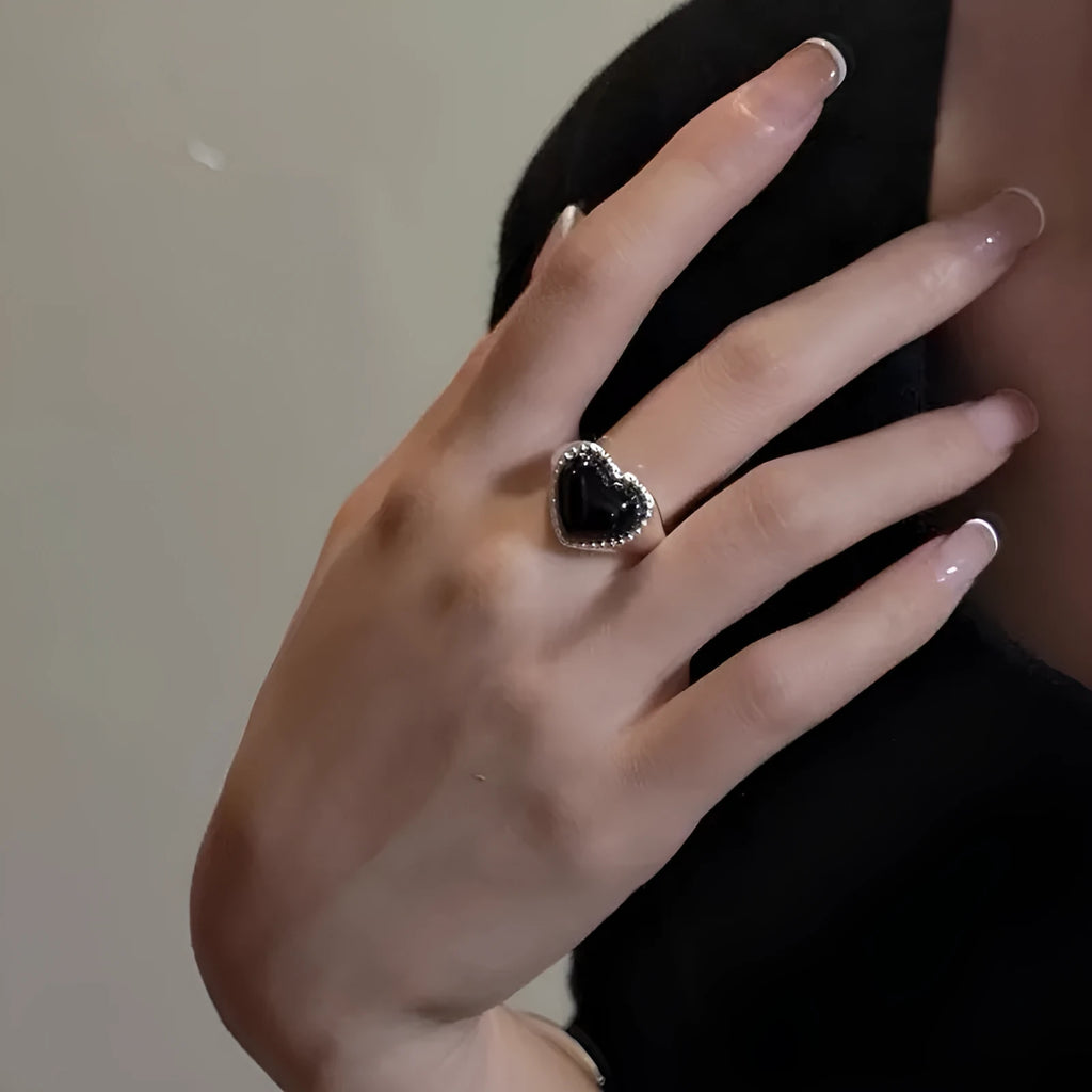 S925 sterling silver adjustable ring with black agate heart stone on finger