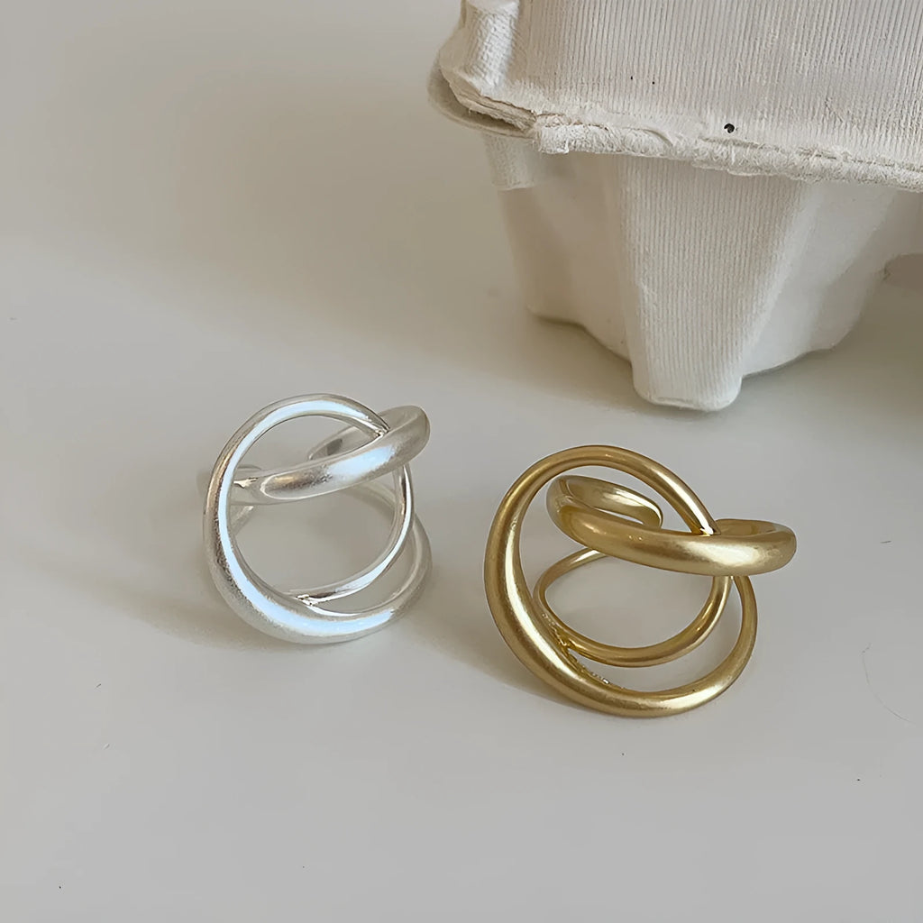3D interlaced geometric open ring for women in matte metal with gold electroplating