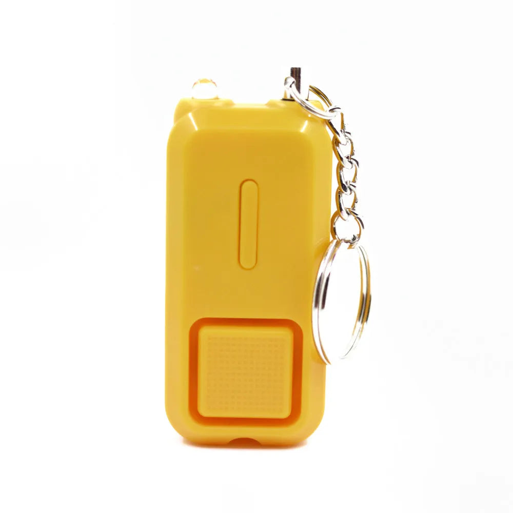 Pink personal safety alarm device measuring 65x30mm with keychain attachment