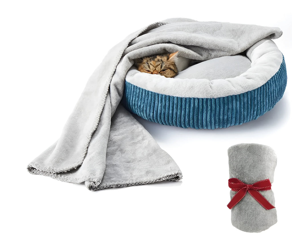 Grey flannel dog blanket 70 by 100 centimetres on a soft surface